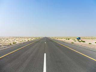Long road in the desert of Oman
