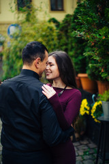 Fototapeta premium happy couple posing in city