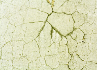 Damaged yellow color old wall surface.