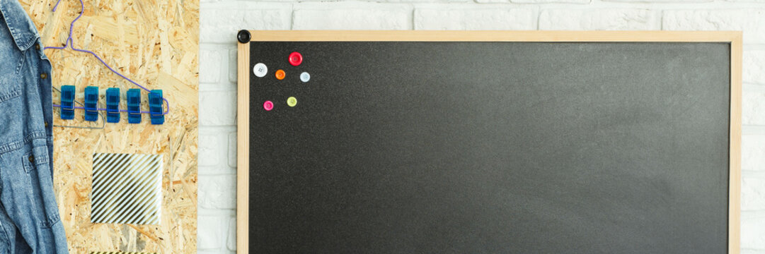 Blackboard with colorful bottons