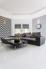Modern room with high-polished white tiled floor