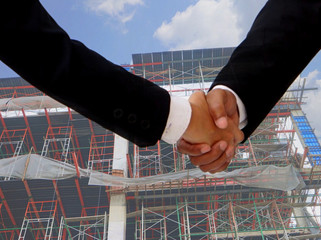 Business people shaking hand, finishing up a meeting