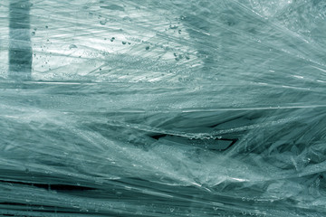 cyan color plastic wrap surface.