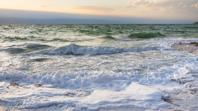 waves at Dead Sea in winter evening