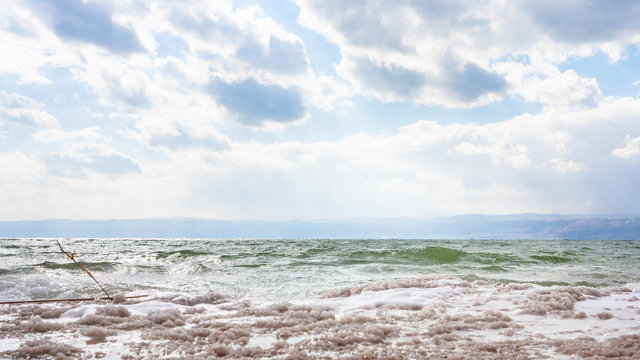 crystalline coastline of Dead Sea shore in winter