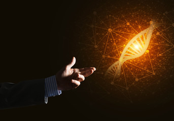 Science medicine and technology concepts as DNA molecule on dark background with connection lines