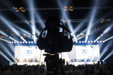 Silhouette of cameras in concert. 