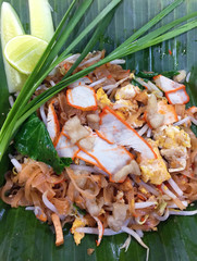 Fried thai noodle mixed with vegetables, pork, tofu, and eggs