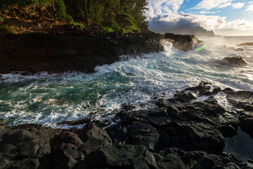 Sunset along the Queens Bath area of Kauai, Hawaii
