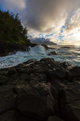 Sunset along the Queens Bath area of Kauai, Hawaii