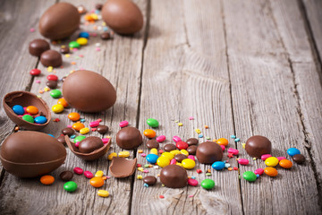 Chocolate Easter Eggs Over Wooden Background