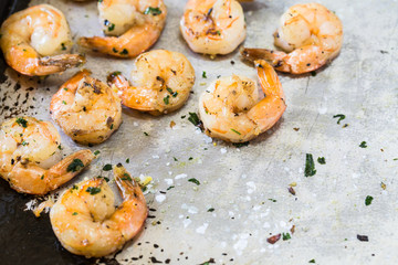 Grilled Shrimp Dinner On Metal Pan With Salt and Parsley