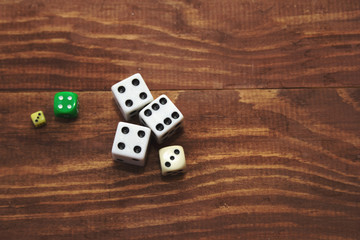 dice on a wooden background