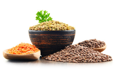 Composition with bowl of lentils isolated on white
