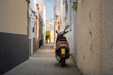Deurstickers Scooter at Icod old town street, Tenerife © AlexanderNikiforov