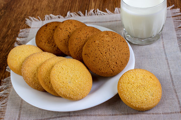 A cookie and a glass of milk for breakfast.