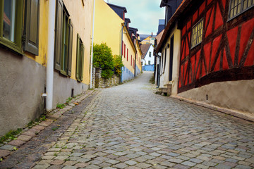 Fototapeta na wymiar Cobblestone street in Visby, Gotland, Sweden