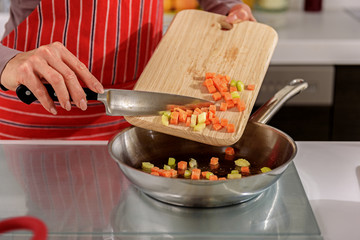 Skillful housewife cooking healthy food