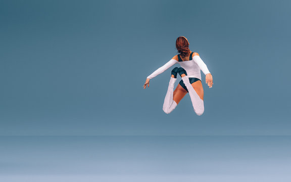 Modern Ballet Dancer Leaping in the Air
