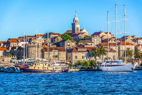 Korcula town seascape. / Seafront view at beautiful Korcula town in summertime, touristic place in Southern Croatia, Europe Mediterranean.