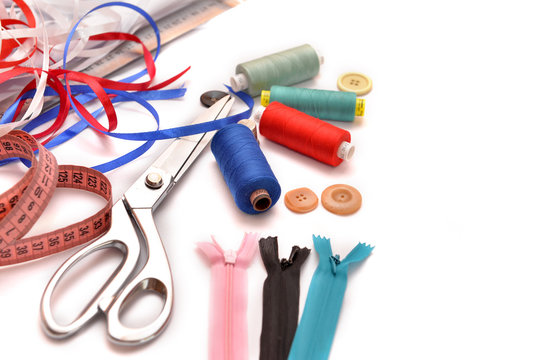 Set of different sewing accessories,fabrics and thread spools