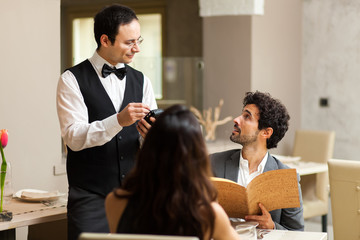 Couple having dinner in a luxury restaurant