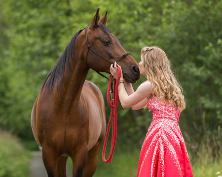 Girl Kissing Horse