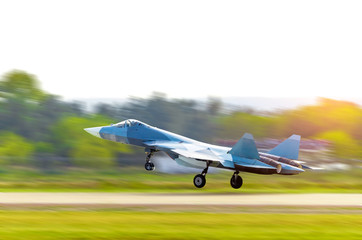 Aircraft fighter jet takes off at speed