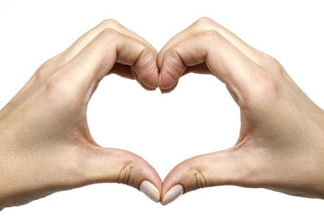 Heart from hands on a white background closeup