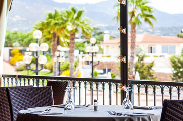 romantic dinner table setup decoration with Selective focus on a sunny day