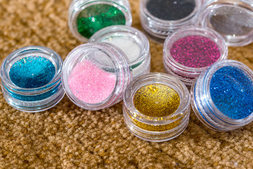 set of nail glitters of different colors, close up.