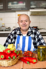 older man preparing vegetarian healthy eating