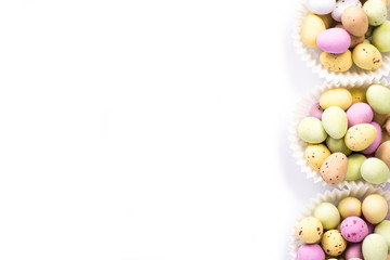 Fototapeta na wymiar Easter eggs in the basket on white background