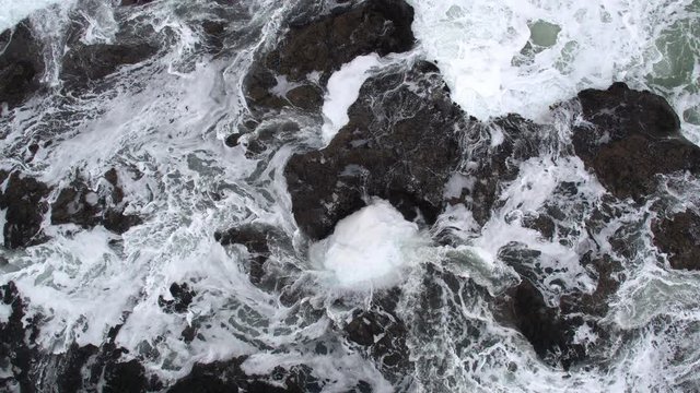 Aerial view of Thors Well sucking water in the rocky shore