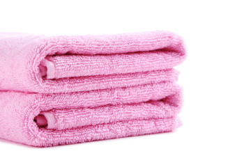 Pink towel isolated on a white background