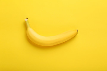 Sweet banana on the yellow background