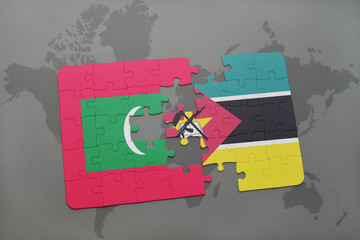puzzle with the national flag of maldives and mozambique on a world map