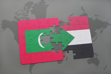 puzzle with the national flag of maldives and sudan on a world map
