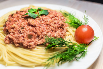 Spaghetti with meat sauce with cherry tomato