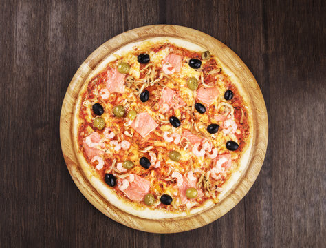 Delicious pizza with salmon