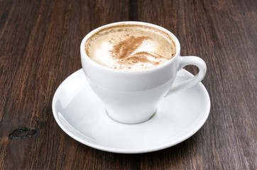 Close up coffee cup with foam