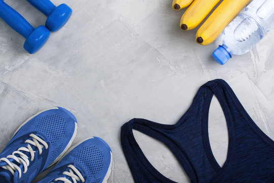 Flatlay composition with sport equipment outfit.