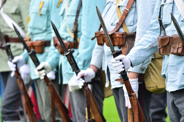 Soldiers in uniforms during military reenactment