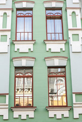 Vintage building and windows with brick wall background