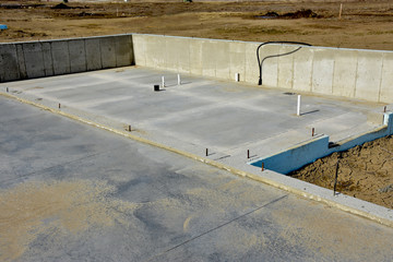 Concrete slab and walls complete, ready for lumber.