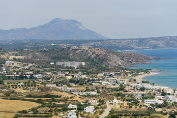 Fototapeta na wymiar Beautiful aerial view of Kefalos village, Kastri island and the coastline of Kos island, Dodecanese, Greece