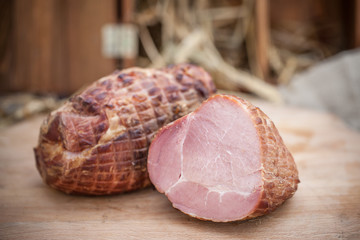 Smoked homemade ham piece made on village farm.