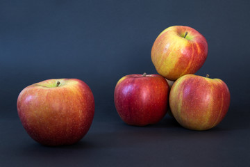 Fresh apples isolated on black background