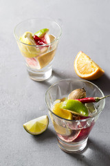 Summer soft drink with orange and lime