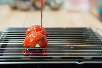 Making mousse pastry, gelatin dessert in process closeup